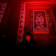 A security officer stand guard in the Forbidden City or Palace Museum lit up as part of celebrations for the Lantern Festival, marking the last day of the Chinese Lunar New Year in Beijing, China, 19 February 2019. For the first time in 94 years, Beijing's Forbidden City is lit up at night and opened to the public to celebrate the Lantern Festival as part of the lunar new year celebrations. Forbidden City or Palace Museum lights up for Lantern Festival, Beijing, China - 19 Feb 2019